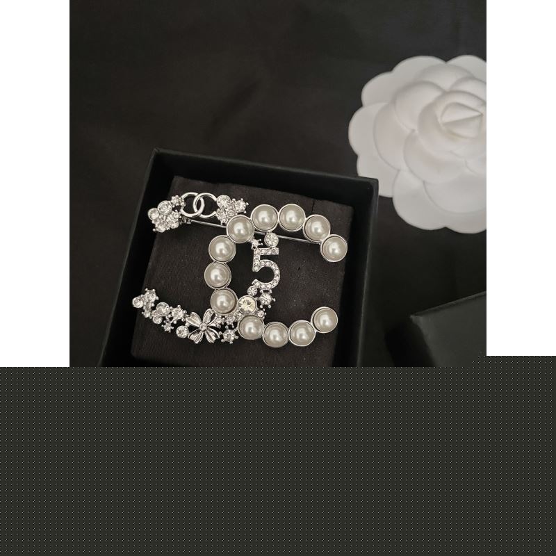 Ch*el brooches